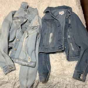 2 Jean jackets , rips in them , thick material